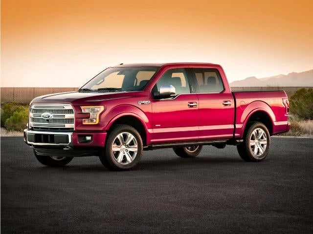 2015 Ford F-150 XLT in White — front three-quarter view