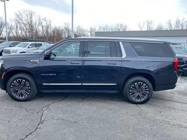2026 GMC Yukon XL — rear three-quarter view