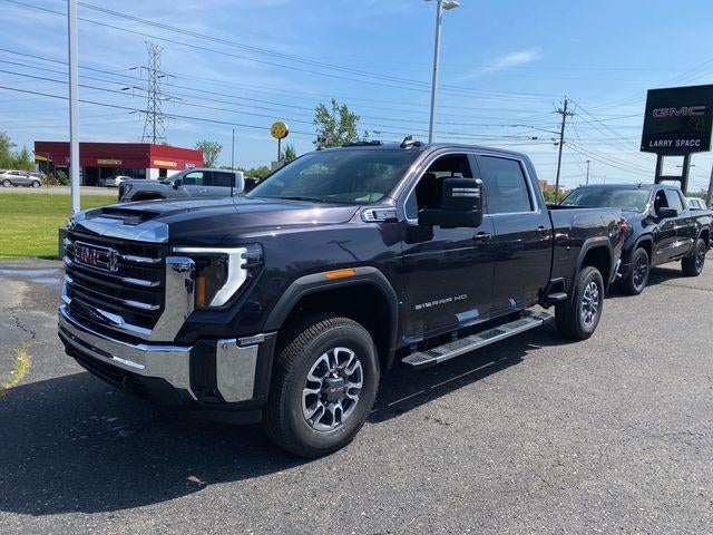2026 GMC Sierra 2500 HD SLE in Titanium Rush Metallic — front three-quarter view