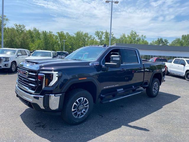 2026 GMC Sierra 2500 HD SLE in Titanium Rush Metallic — front three-quarter view