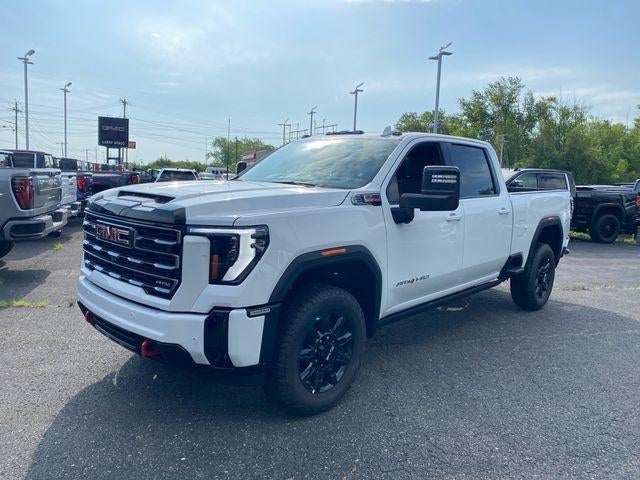 2026 GMC Sierra 3500 HD AT4 in Summit White — front three-quarter view
