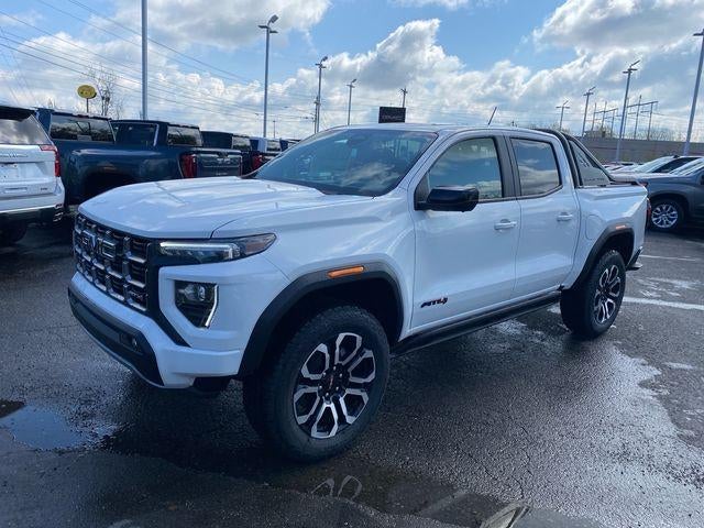 2026 GMC Canyon AT4 in Summit White — front three-quarter view