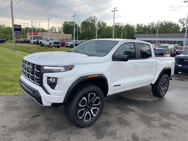 2026 GMC Canyon AT4 in Summit White — front three-quarter view