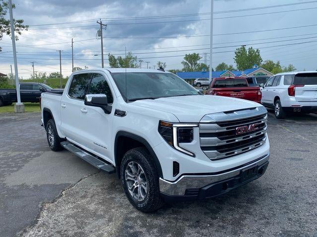 2026 GMC Sierra 1500 SLE in Summit White — front three-quarter view